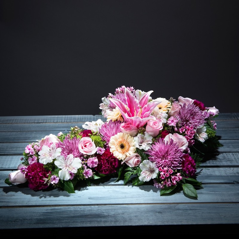Cruz de flores funeraria